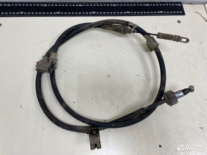 Трос стояночного тормоза левый Kia Ceed dohc - MPI