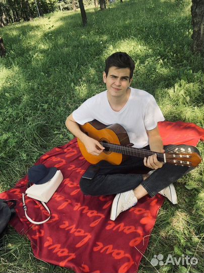 Репетитор по игре на гитаре