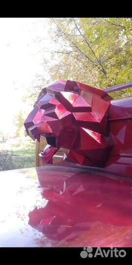 Фигура льва из металла