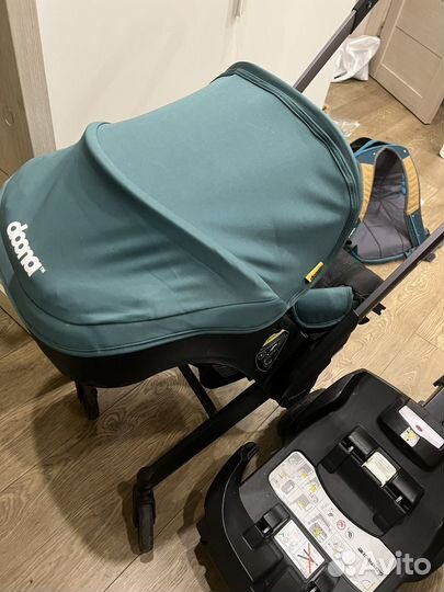 Коляска автокресло doona с базой isofix