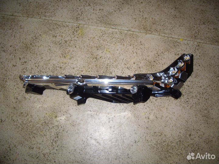 Стекло фары правой Джили Эмгрант с 09