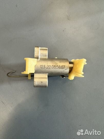 Натяжитель цепи грм