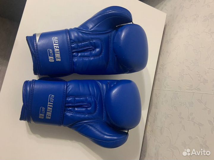 Боксерские перчатки 12 oz clinch