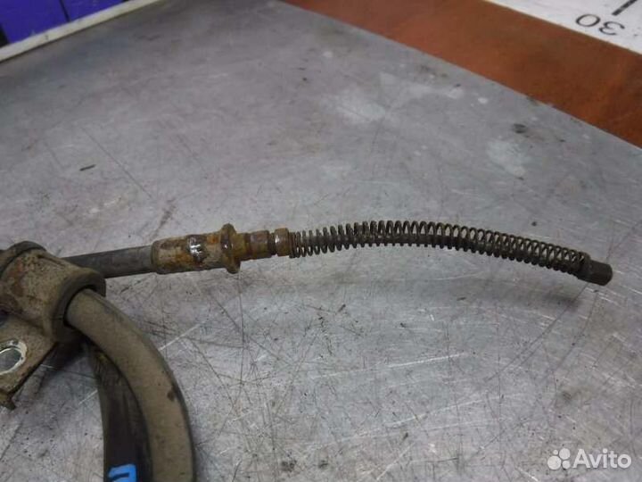 Трос ручника левый Mitsubishi Pajero Sport 2 4D56