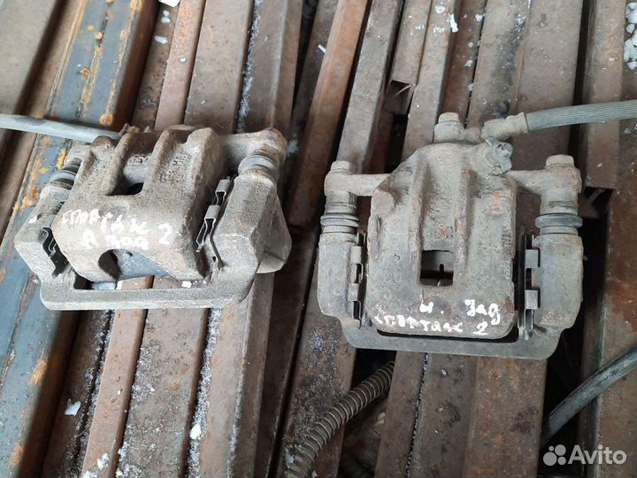 Kia Sportage 2 суппорт задний