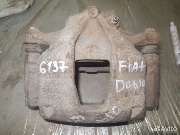Суппорт тормозной передний левый Fiat Doblo