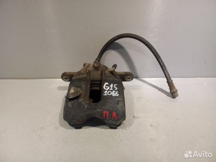 Суппорт передний левый Nissan Almera G15 седан