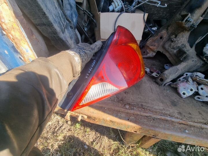 Kia Spectra правый фонарь орига