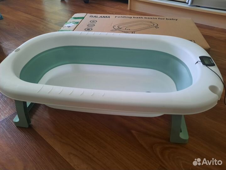 Новая ванночка для купания новорожденного