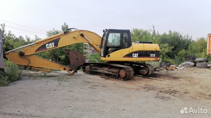 Услуги экскаватора - погрузчика