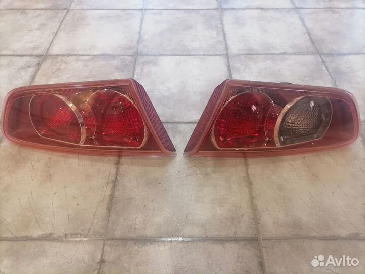 Фонарь крышки багажника Mitsubishi Lancer 10