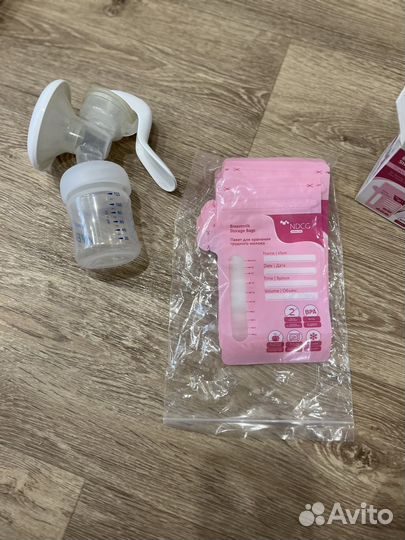 Молокоотсос avent ручной и пакеты для молока