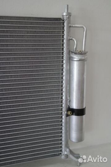 Радиатор кондиционера Ниссан Тиида 02