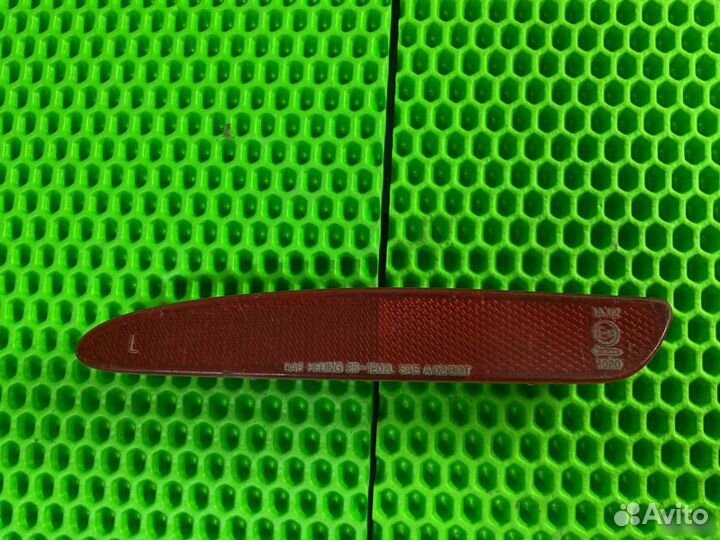 Отражатель в бампер левый Chevrolet Lacetti