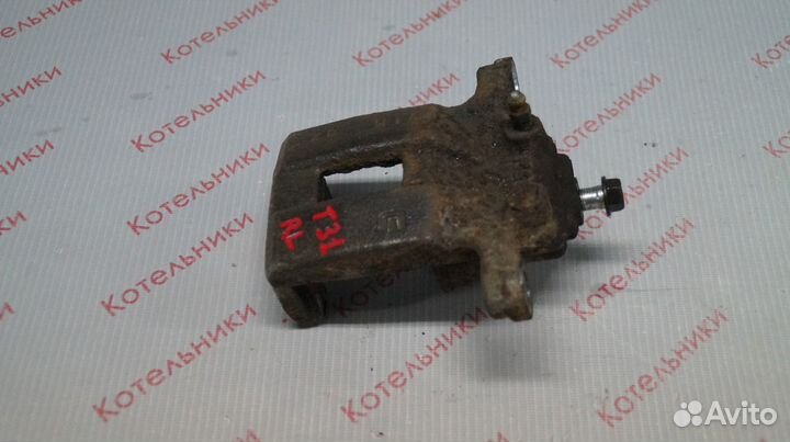 Nissan 44011-JG00A Суппорт зад левый