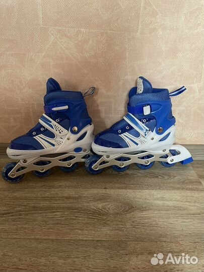 Роликовые коньки новые