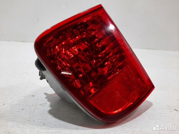 Фонарь противотуманный задний левый Toyota Land