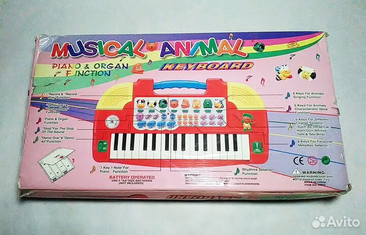 Музыкальная игрушка (пианино и орган) для малышей