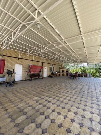 Коттедж 372 м² на участке 12 сот.