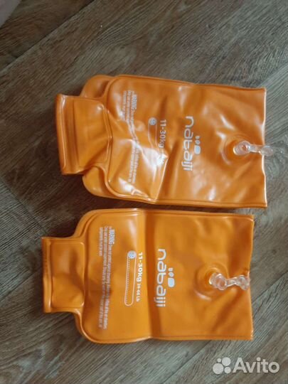 Нарукавники и жилетка для плавания