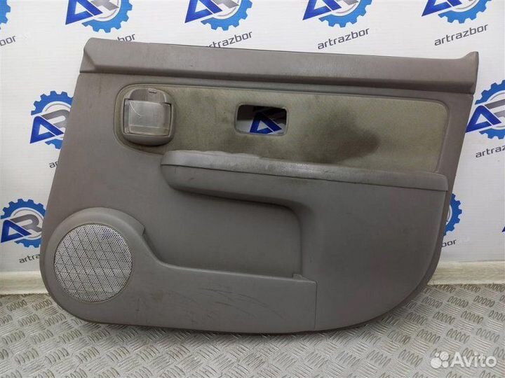 Обшивка двери передней правой Nissan Cube 1 Z10