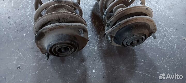 Стойка передняя Mitsubishi Mirage