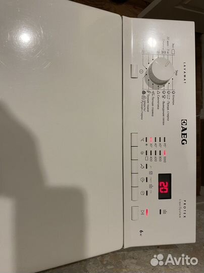 Стиральная машина с вертикальной загрузкой