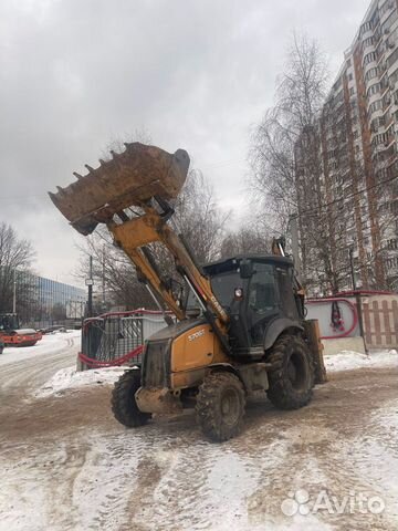 Аренда экскаватора погрузчика с гидромолотом