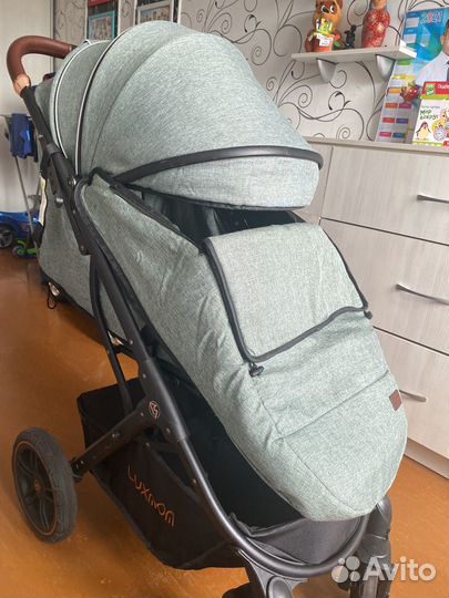 Прогулочная коляска luxmom 609