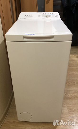 Стиральная машина с вертикальной загрузкой indesit
