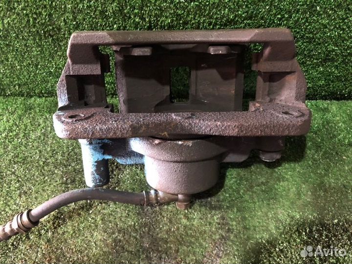 Суппорт тормозной передний правый Mazda Premacy