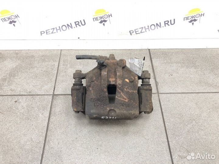 Суппорт тормозной передний левый Kia Ceed хэтчбек