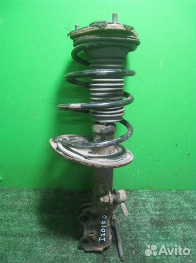 Стойка амортизатора передняя правая Toyota Verso