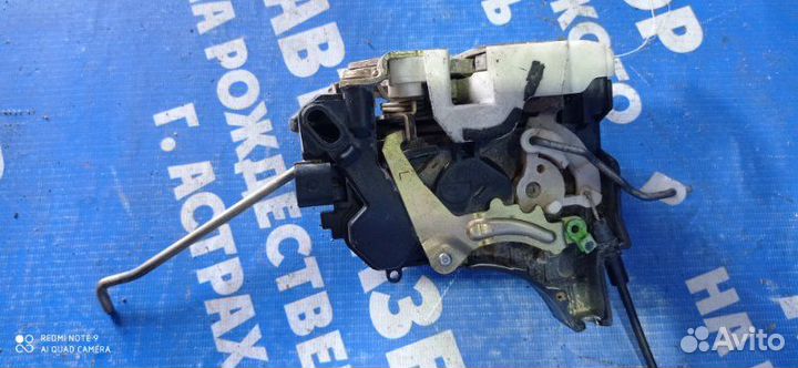 Передний левый замок двери Mitsubishi Lancer 9