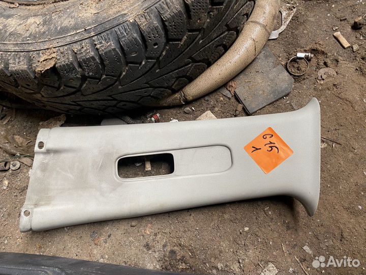 Обшивка стойки средней левой верхняя Nissan Almera