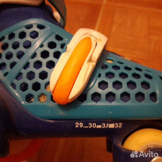 Роликовые коньки раздвижные четырехколесные