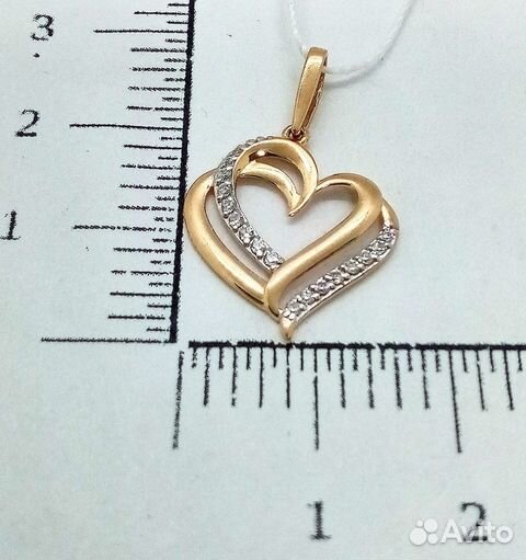 Золотая подвеска с камнем