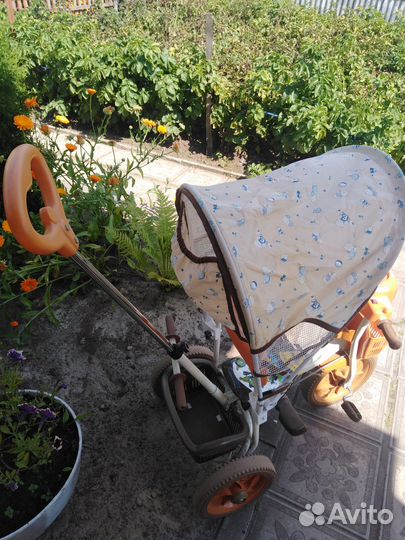 Детский трехколесный велосипед с ручкой