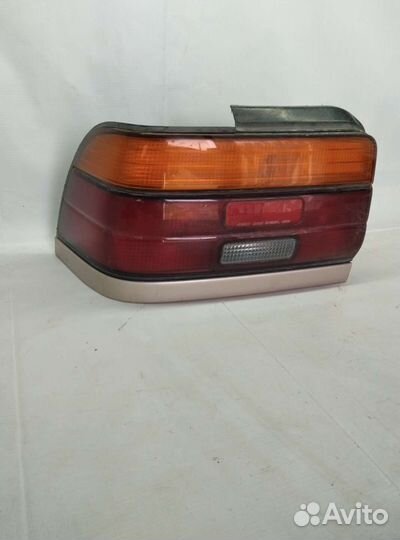 Фонарь левый Toyota Corolla 100