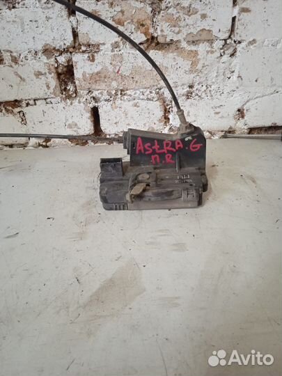 Замок двери передний правый Opel Astra G
