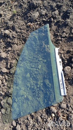 Стекло двери передней левой Opel Astra