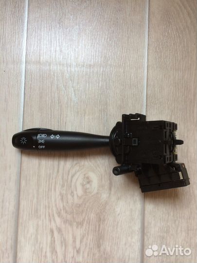 Подрулевой переключатель света фар левый