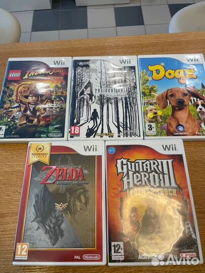 Продам Nintendo Wii + Guitar Hero 3 + 5 игр