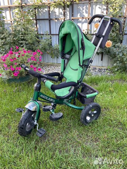 Трехколесный велосипед с ручкой