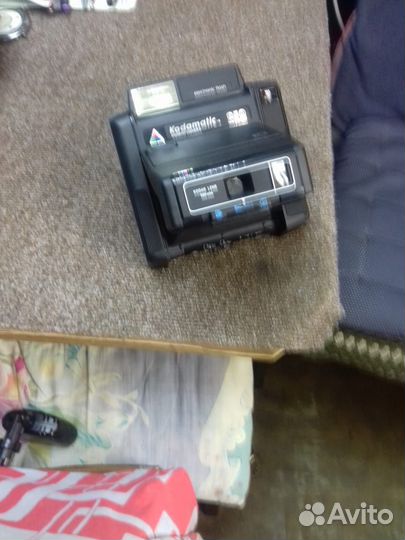 Фотоаппарат Поляроид и Кодаматик