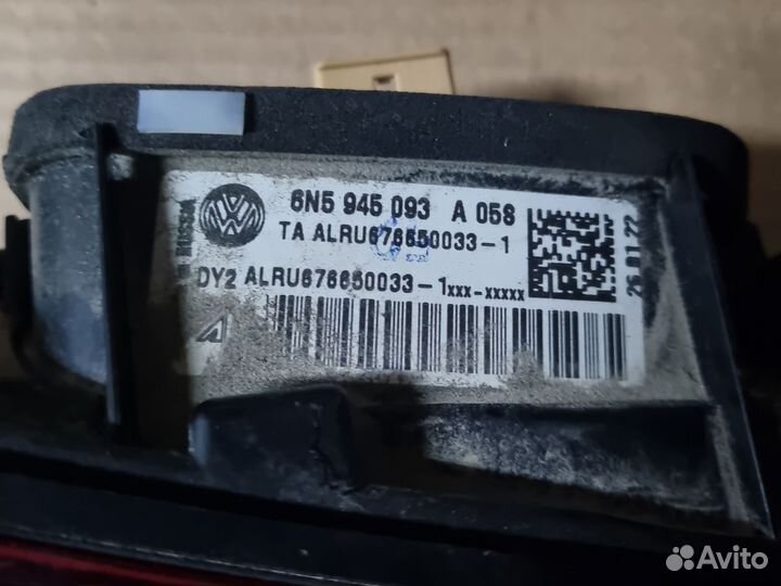 Фонарь левый в крышку багажника Volkswagen Polo