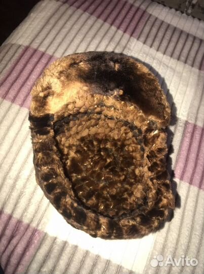 Женские меховые шапки