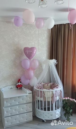 Детская кроватка с маятником