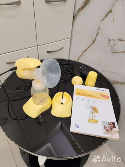Молокоотсос medela mini electric