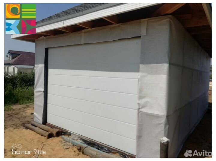 Секционные ворота для гаража alutech